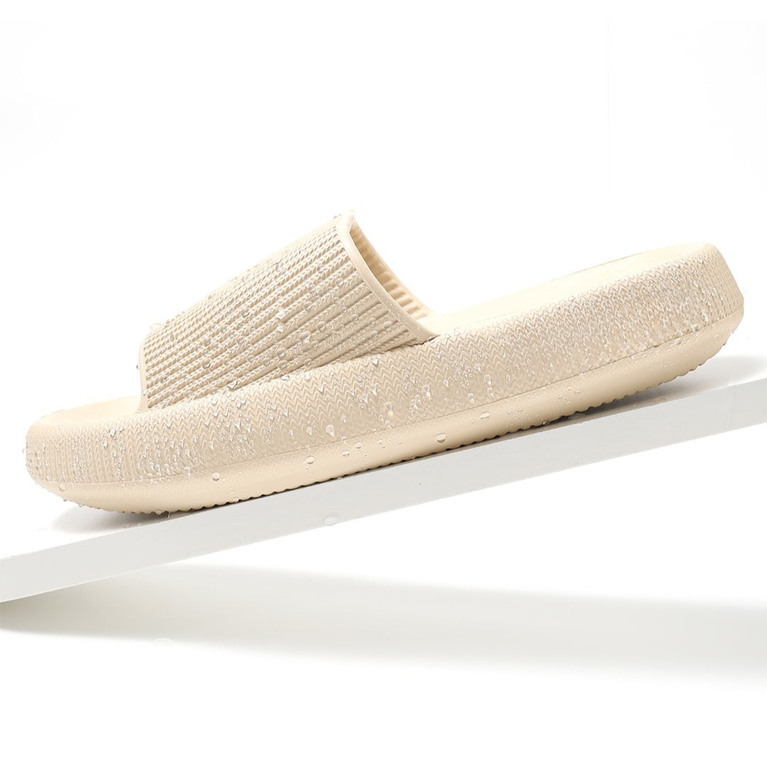 LyckaSteps™ - Den fjädrande badtoffeln som minskar trycket på lederna och känns som att gå på moln